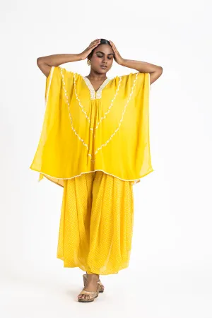 YELLOW GEORGETTE TUNIC WITH PRINTED GEORGETTE COWL SALWAR